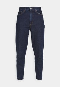 Mörkblå högmidjade jeans med en avsmalnande passform. Tillverkade av denimtyg, med standard framfickor och detaljer i orange sömnad.