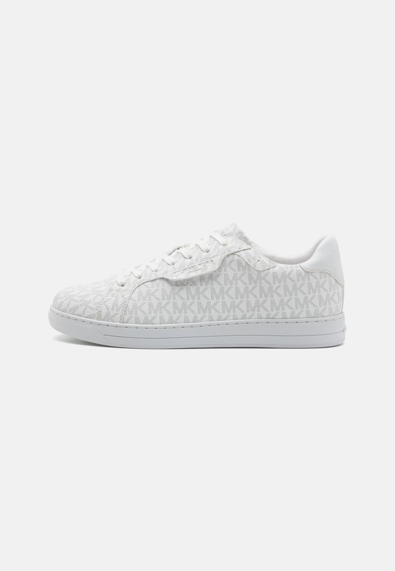 White sneakers featuring a textured pattern in light gray with logo accents, flat laces, and a smooth rubber sole. Simple low-top design.