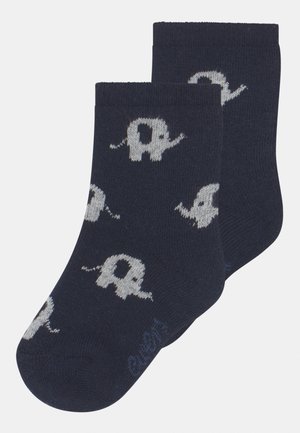 Calze di cotone blu navy con motivi di elefanti grigi chiari su tutta la superficie. Presentano un bordo a costine e una texture liscia. Design casual, lunghezza alla caviglia.