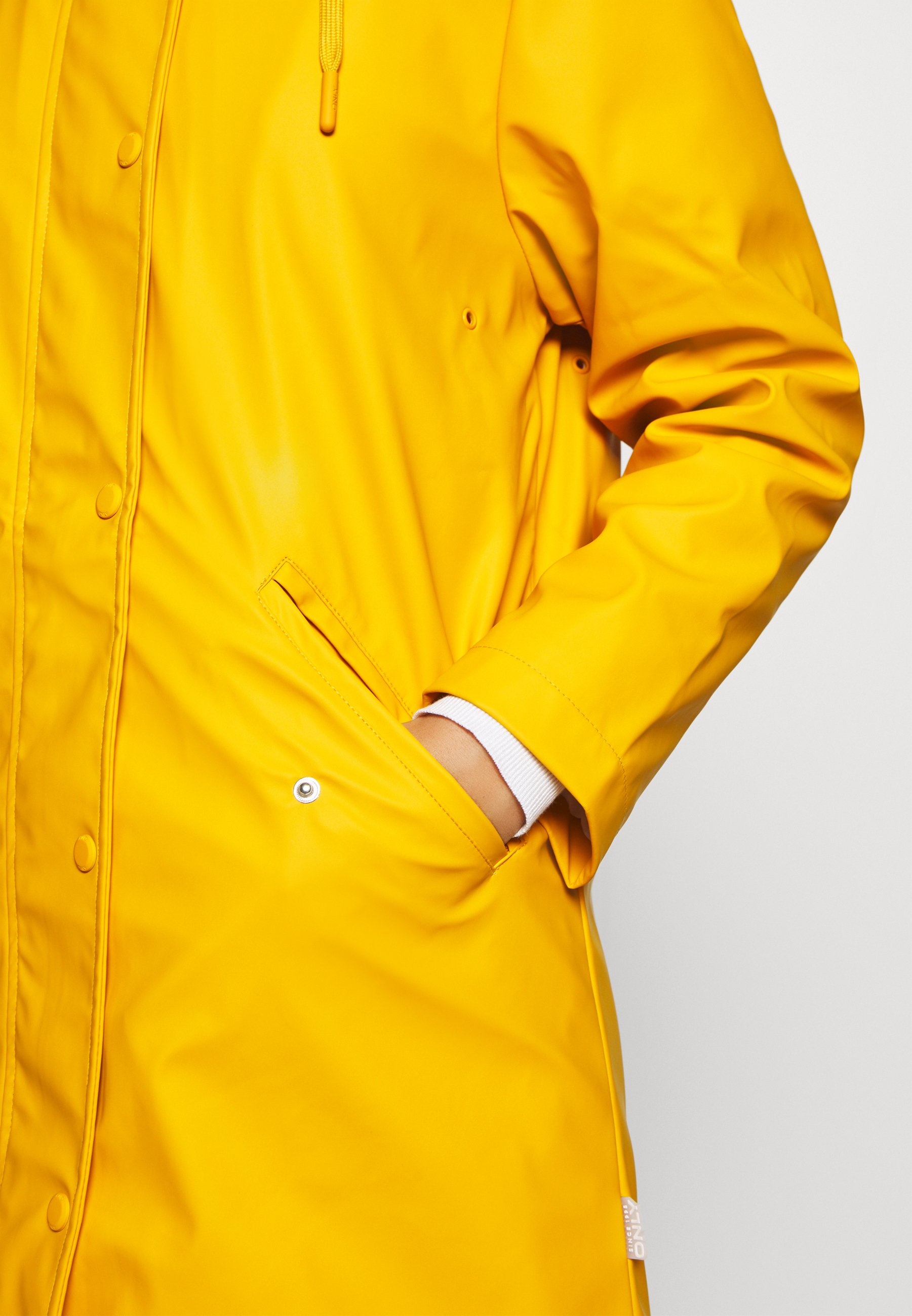 petite yellow raincoat