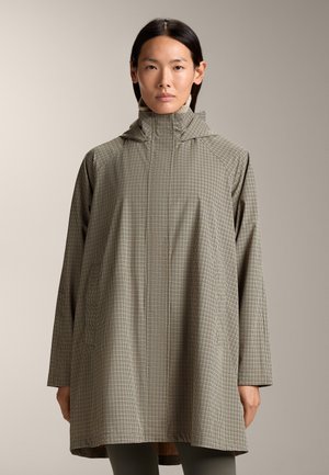 Hooded, oversized jas in een ruitpatroon met een hoge kraag, lichte stof en zijzakken. Kleurenpalet omvat aardetinten.