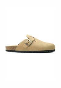 Tan suede slip-on clog with a wide strap and silver buckle. Cork midsole, black rubber outsole with textured pattern for grip.