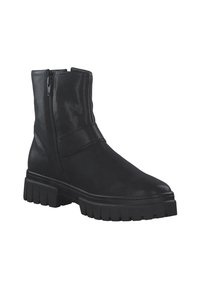 Stivaletti neri realizzati in pelle liscia, dotati di una cerniera laterale, suola in gomma larga con righe e un design elegante con punta piatta.