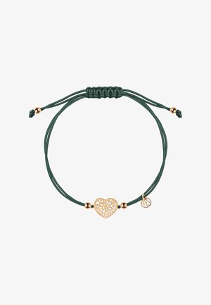 Zielona bransoletka z sznurkami z filigranowym sercem w kolorze złotym oraz złotymi koralikami. Regulowane zapięcie na węzełek. Lekki i delikatny design.