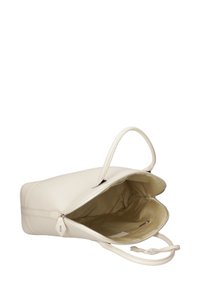 Borsa tote in pelle crema con doppi manici e chiusura con zip, presenta un interno spazioso e una piccola tasca con zip all'interno.