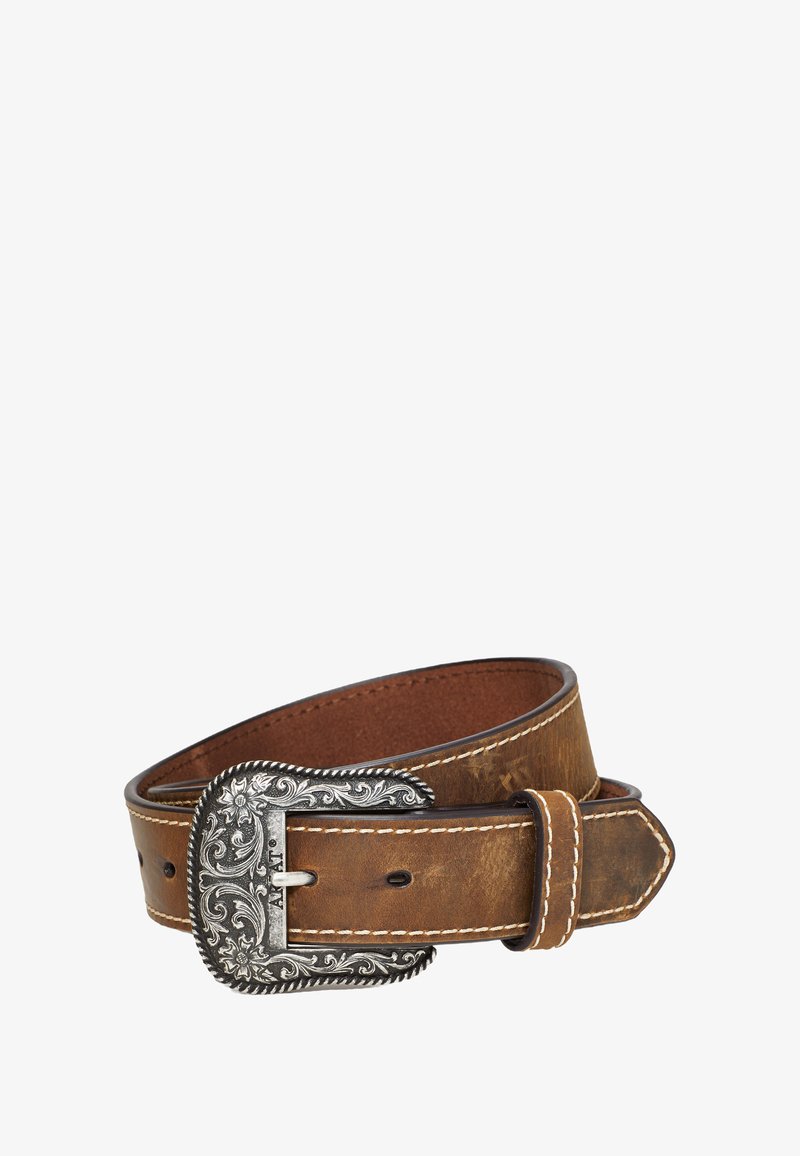 Leather belt in brown with a wide, ornate silver buckle. Features white stitching and a smooth texture. Adjustable with a pointed tip.