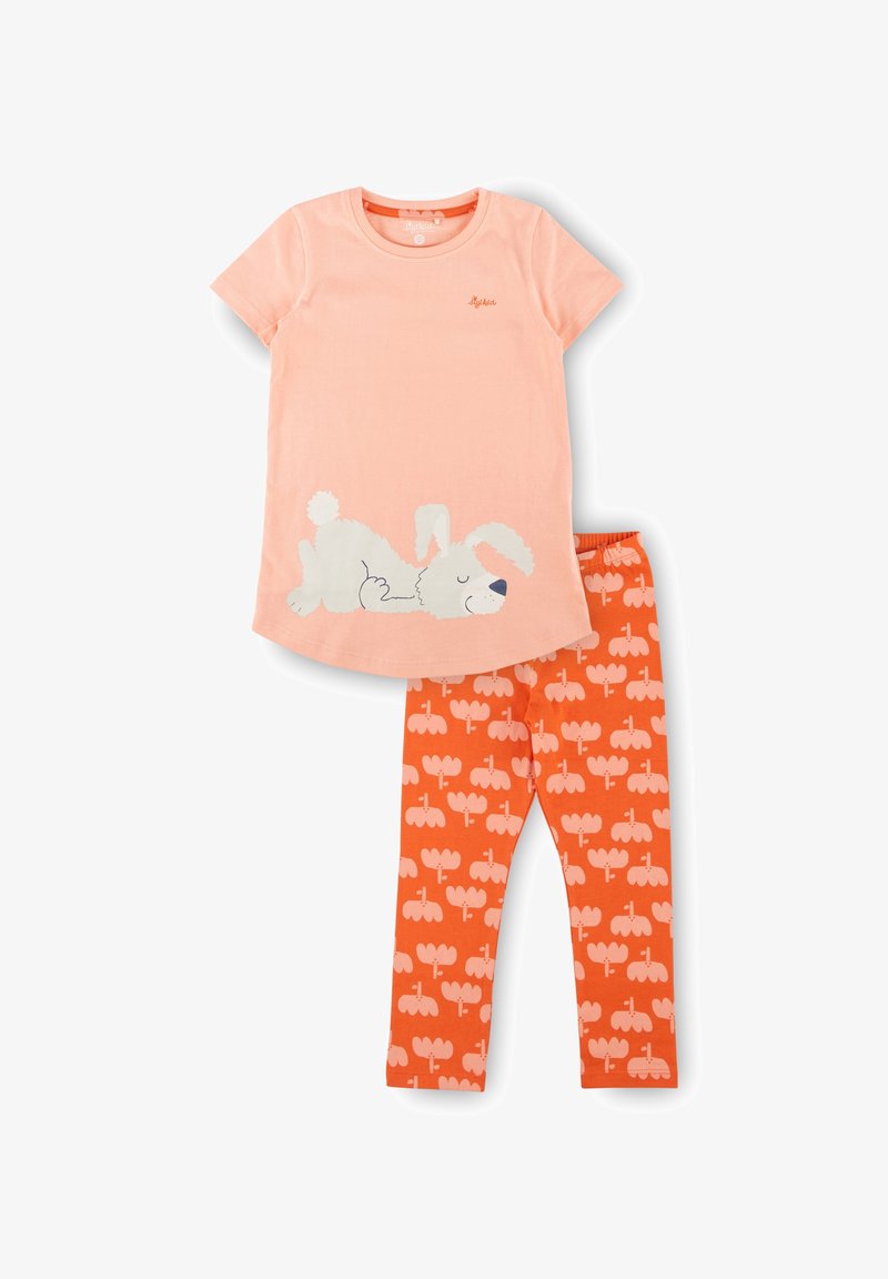 Baumwoll-Set für Mädchen mit einem hellrosa T-Shirt, das eine schlafende weiße Hundegrafik zeigt, kombiniert mit orangen Leggings, die mit Hundemotiven verziert sind.