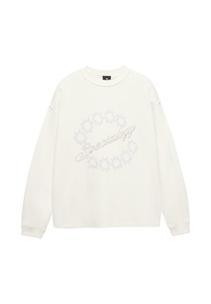 Biała bluza z luźnym krojem, z okrągłym dekoltem i długimi rękawami. Szczegóły obejmują wzory gwiazdek i tekst w srebrnych akcentach.