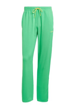 adidas Originals ZIP FLARE - Tracksuit bottoms - energy green