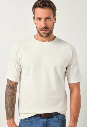 Crème sweatshirt met korte mouwen, ronde halslijn en raglanmouwen. Gemaakt van zachte stof, met een gestructureerde afwerking en rechte zoom.