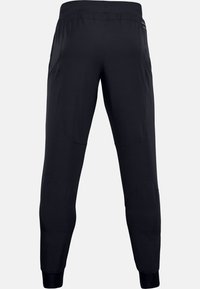 Under Armour UNSTOPPABLE JOGGERS - Tracksuit bottoms - black
