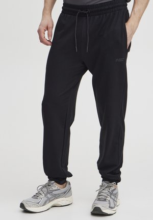 BRAIDY  - Tracksuit bottoms - black