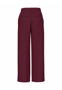 Burgundy vida byxorna med resårmidja, som har två bakfickor och ett mjukt, texturerat tyg.