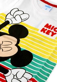 Short-sleeve white T-shirt featuring Mickey Mouse graphic, yellow and green horizontal stripes, and red "MICKEY" text in bold letters.
