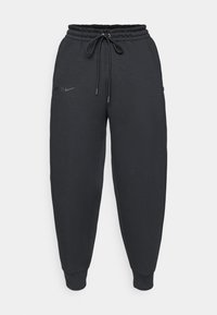 Calças de fato pretas feitas de uma mistura de algodão, com uma cintura elástica ajustável, punhos estreitos e um logótipo discreto na parte da frente.