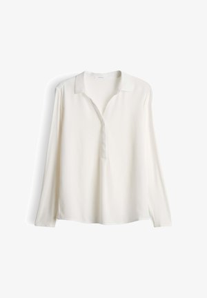 Chemise à manches longues et col en ivoire clair, fabriquée en tissu lisse et léger. Présente une patte de boutonnage à l'avant et des fentes sur les côtés pour un ajustement décontracté.
