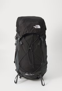 Sac à dos de randonnée noir avec des sangles ajustables, un rabat supérieur et un cordon élastique à l'avant. Présente le logo "THE NORTH FACE" et le texte "TRAIL LITE 36".