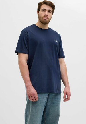 Navy blue cotton t-shirt with short sleeves and a round neck, featuring a small logo on the chest and a relaxed fit.