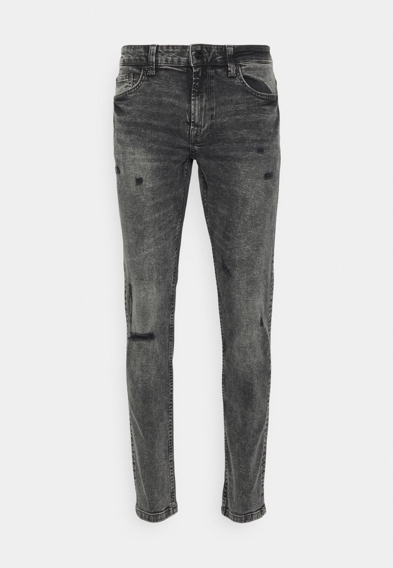Vaqueros skinny de lavado negro con ligeros detalles desgastados en las piernas delanteras y estilo clásico de cinco bolsillos.