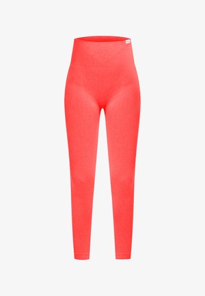 Leggings a coste in un vivace colore corallo con un alto punto vita. Realizzati in materiale elastico, presentano una texture liscia e un design aderente.