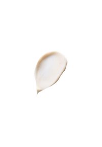 Krämig lotion med en jämn konsistens, off-white färg och en lätt glans, presenterad som en dropp på en vit bakgrund.