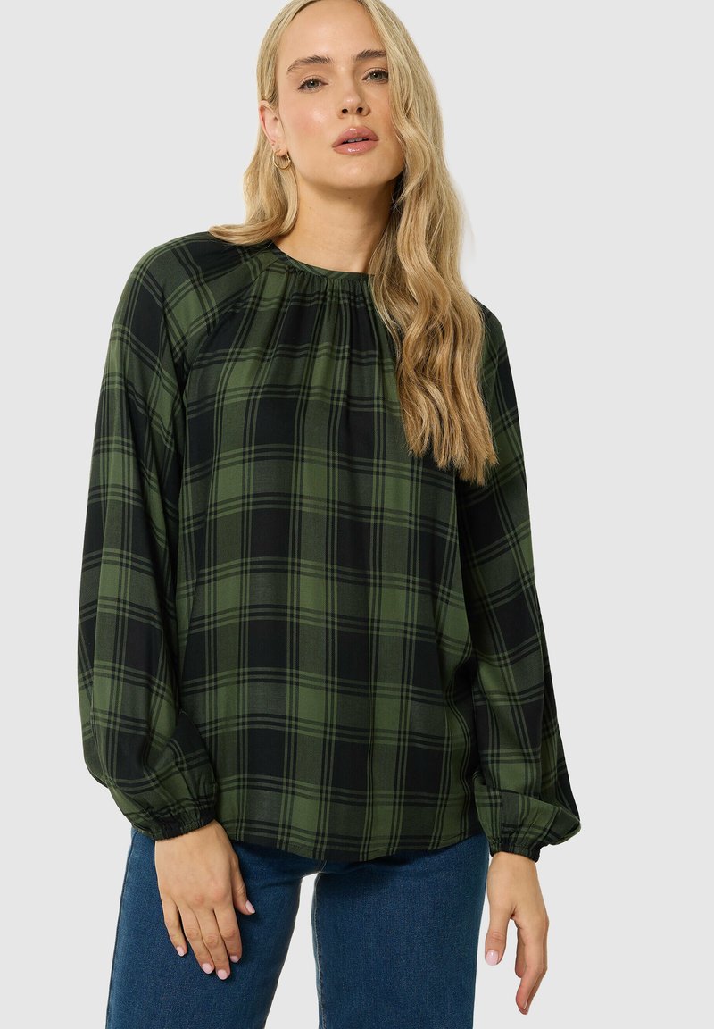 Grüne und schwarze karierte Bluse mit einem gerafften Ausschnitt und langen Puffärmeln. Hergestellt aus leichtem Stoff, mit einer lockeren Passform und elastischen Bündchen.