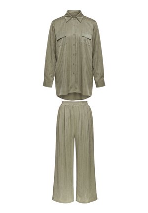 Olive green women's two-piece outfit with long-sleeve button-up shirt, breast pockets, and matching wide-leg elastic waist pants.