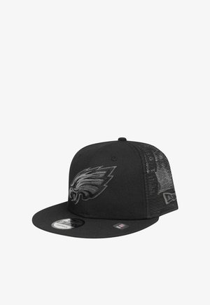 Casquette snapback en mesh noire avec logo noir en relief des Philadelphia Eagles à l'avant et visière plate avec autocollant NFL.