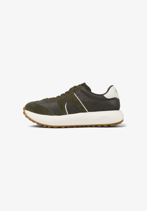 Olive green sneaker with suede and leather materials, white accents, rounded toe, thick white outsole, and textured gum rubber outsole.