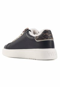 Black leather sneaker with white sole. Features a leopard print accent on the heel and soft interior lining. Textured surface and rounded shape.