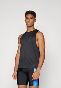 Black sleeveless tank top with a textured finish, paired with fitted black shorts featuring a blue accent panel and wave pattern.