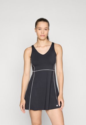 Black tank dress featuring a V-neck, white contrasting lines along the sides and hem, and a logo accent at the lower hem. Smooth texture.
