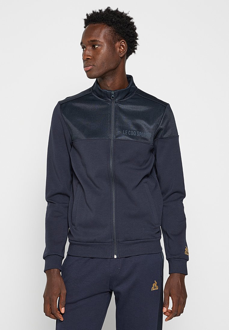 Le Coq Sportif Trainingsvest donkerblauw Le Coq Sportif Trainingsvest donkerblauw