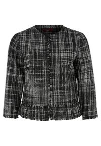 Mustavalkoinen ruudullinen tweed-takki, jossa on pyöreä kaula-aukko, etupainikekiinnitys ja frayed-helma; teksturoitu kangas ja sovitettu siluetti.