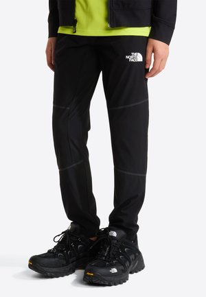 The North Face, TEEN MOUNTAIN ATHLETICS PANT UNISEX - Долнище на анцуг - black