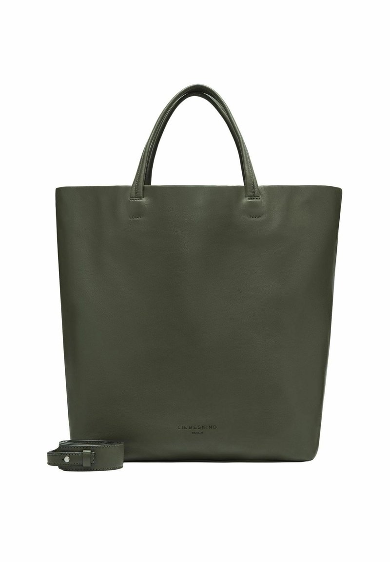 Una borsa tote in pelle verde scuro con due manici e una tracolla rimovibile posizionata accanto, su uno sfondo semplice.
