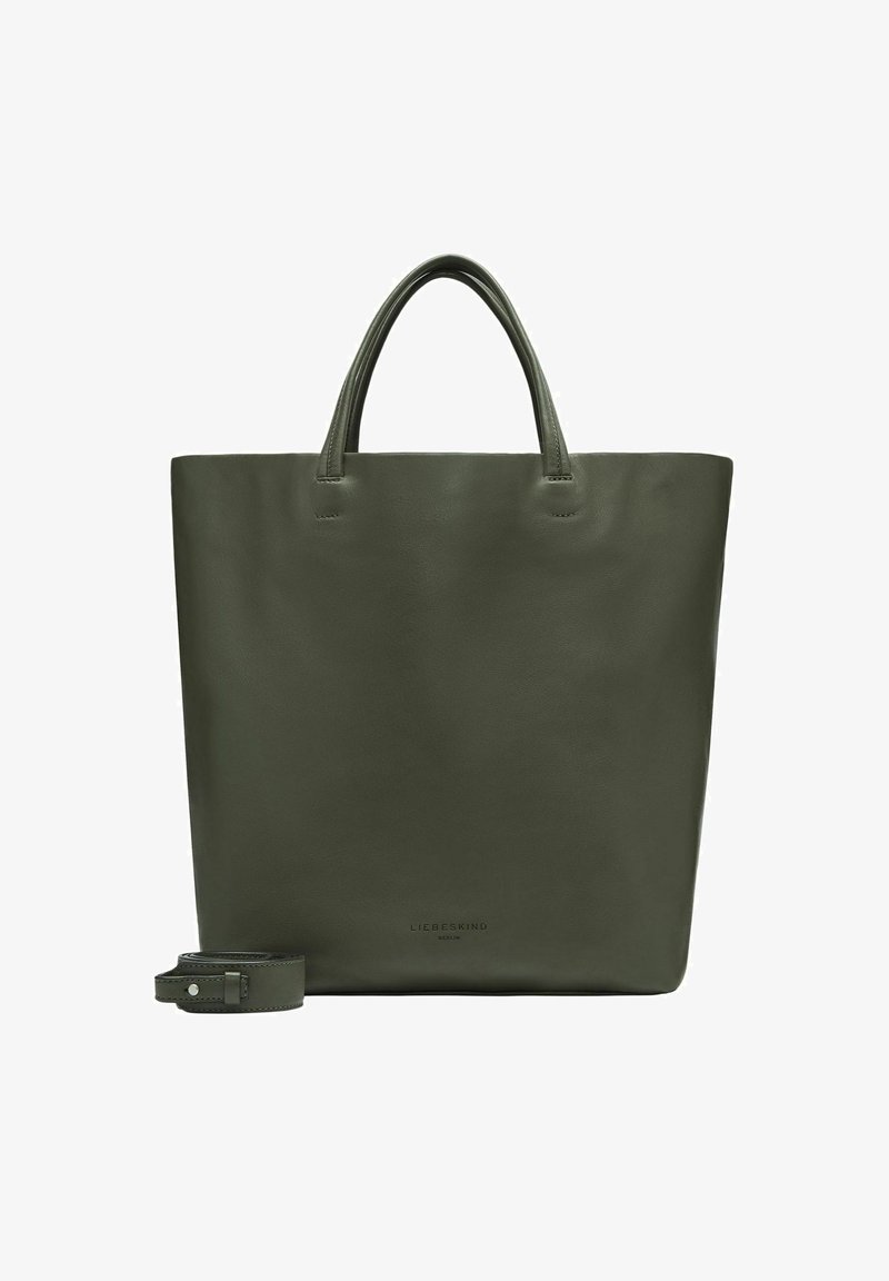 Ciemnozielona skórzana torba tote z dwoma uchwytami i odpinanym paskiem, umieszczona obok, na jednolitym tle.