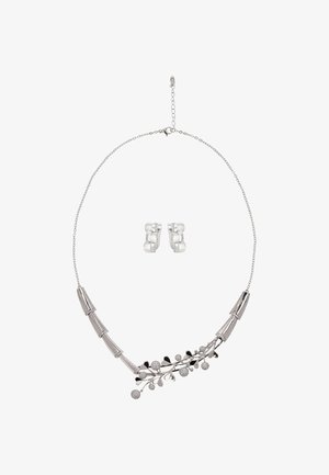 Silver necklace featuring curved tube links and a leaf design with round accents. Includes matching silver earrings.