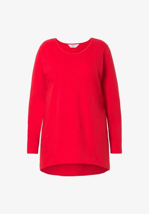 Top rosso a maniche lunghe realizzato in tessuto morbido. Presenta un collo rotondo, una vestibilità comoda e un orlo asimmetrico. Tessuto liscio con dettagli minimi.