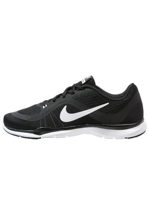 Chaussure de course Nike noire avec logo swoosh blanc, semelle blanche et lacets noirs, vue de côté extérieur sur fond blanc.