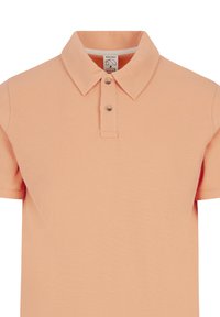 Perzikkleurige poloshirt van gestructureerde stof met een klassieke kraag, een twee knopen sluiting en korte mouwen.