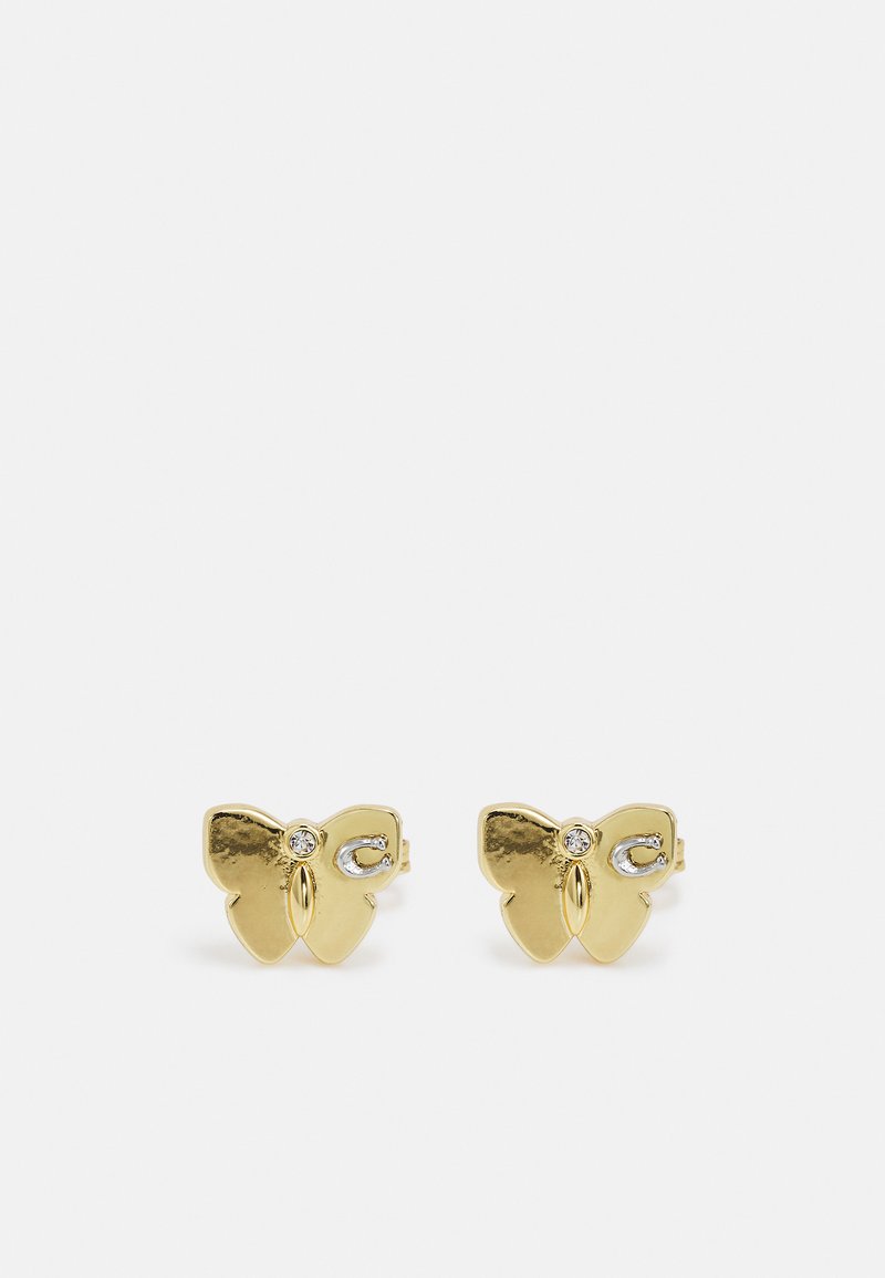 Pendientes de stud en forma de mariposa de oro con una superficie brillante y un pequeño acento de gema clara en el centro de cada pendiente.