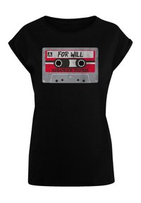 Black T-shirt featuring a graphic of a cassette tape with red accents, silver details, and text reading "A FOR WILL STRANGER THINGS."