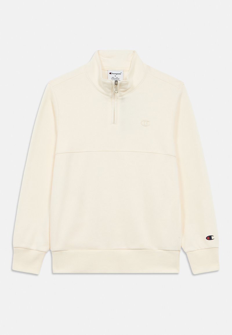 Ανοιχτόχρωμο μπεζ φούτερ Champion με φερμουάρ μέχρι τη μέση, γιακά σε όρθια μορφή, μακριά μανίκια, ριμπ μανσέτες και τελείωμα, και μικρό λογότυπο στο στήθος και στο μανίκι.