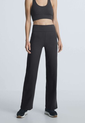 COMFORT - Pantaloni sportivi - black