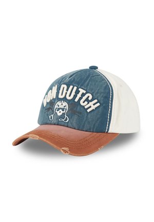 Une casquette avec un dessus en denim bleu, des côtés crème et une visière usée en marron. Présente une broderie "VON DUTCH" et un motif de skull.