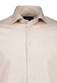 Hellbeige Hemd mit Knöpfen aus strukturiertem Stoff, mit klassischem Kragen und fünf passenden Knöpfen vorne.