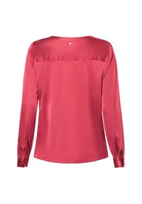 Langärmlige Bluse aus lebhaftem pinken Seide, mit glatter Textur, rundem Ausschnitt und einer kleinen detaillierten Verzierung auf der Rückseite.