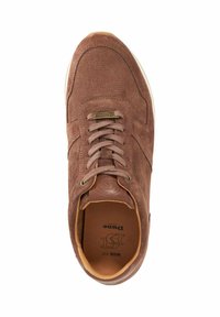 Brown suede sneaker with textured surface and lacing system, features a tan leather accent inside and branded logo on the tongue.