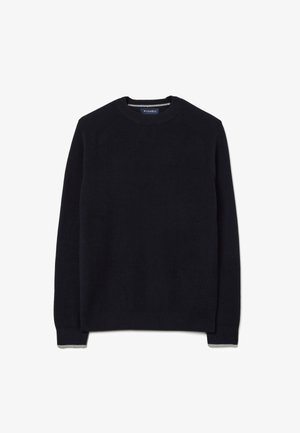 Donker marineblauwe gebreide trui met een ronde hals, ribbelstructuur en lange mouwen. Bevat subtiele grijze accenten op de manchetten en de onderrand.